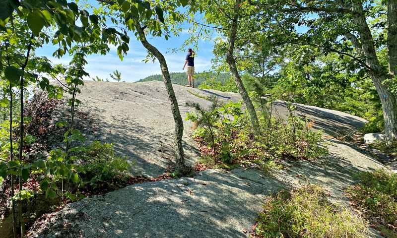 man standing on rock High Peterskill Trail Mohonk - Minnewaska Hudson Valley