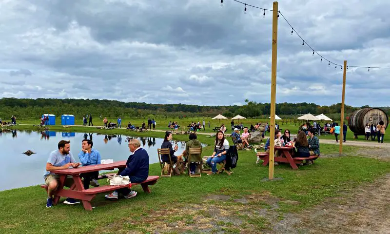 Brooklyn Cider House picnic tables and lake